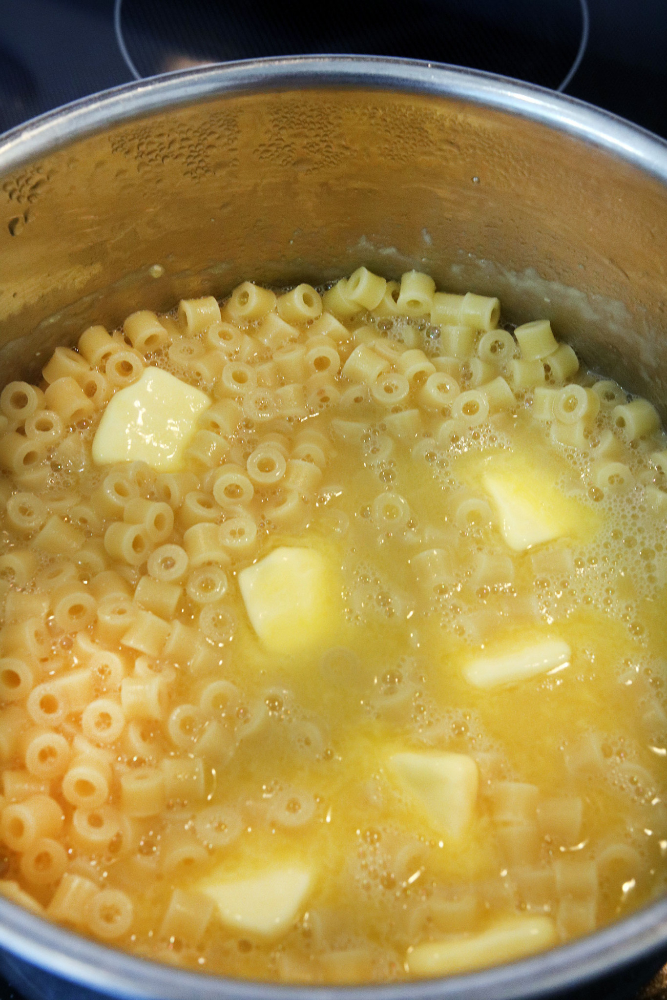 Cheesy and Buttery Chicken Broth Noodles Bowl