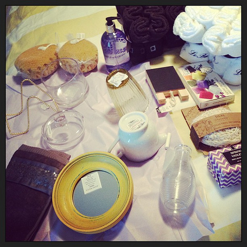 Misc. bath decor I purchased for PB cabinet with baskets. Time to decorate!! Anyone know if theres a way to make gray towels I bought in bulk a lighter gray?!