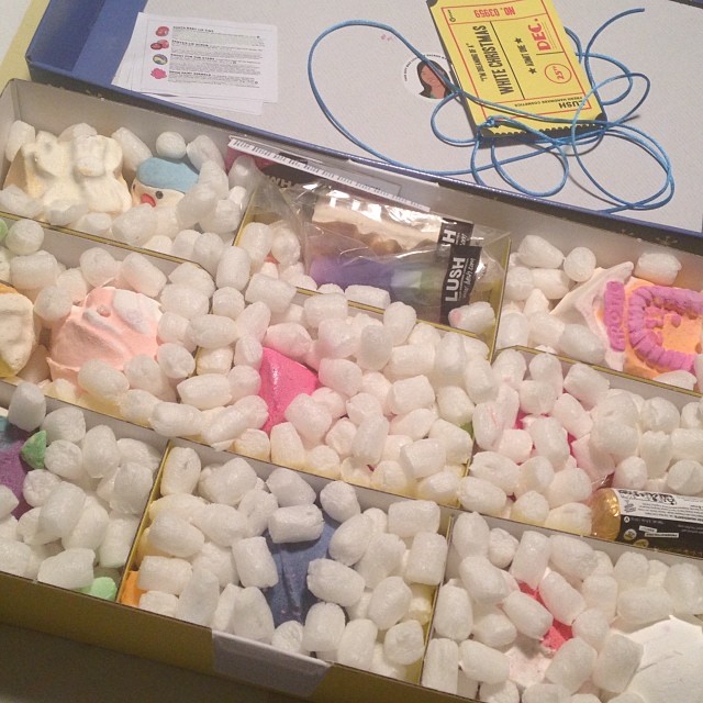 I have enough Lush to last me a year!! This box smelled SO good when I opened it up!! I especially love the penguin bath bomb on upper left corner. There is also a Secret Santa bath bomb that has a secret gift inside!! My man knows what my body needs!!! ❤