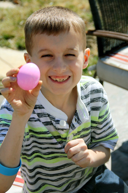 Nat-holding-up-pink-egg