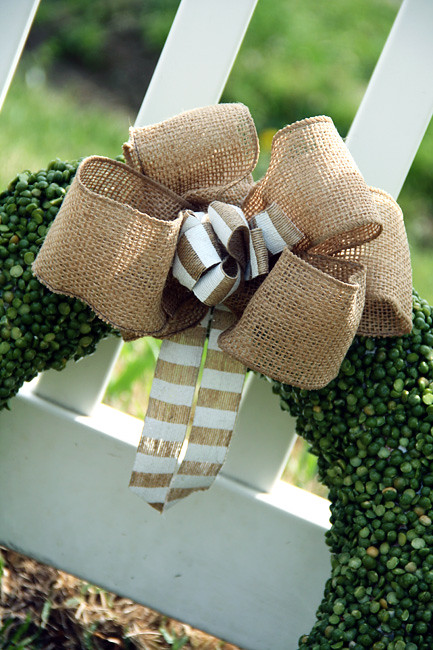 Done_Pea-Wreath-Bow-Against-Fence