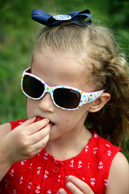 Aut-taking-a-juicy-bite-of-her-berry