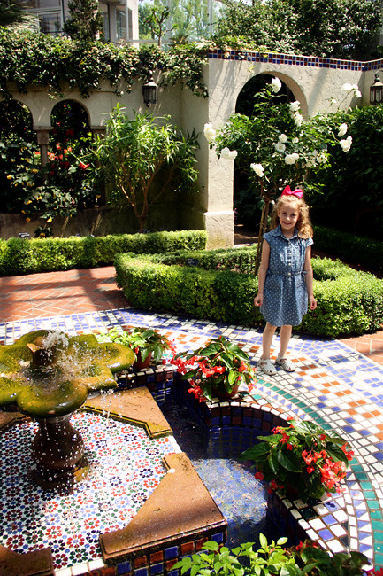 Aut-standing-in-garden