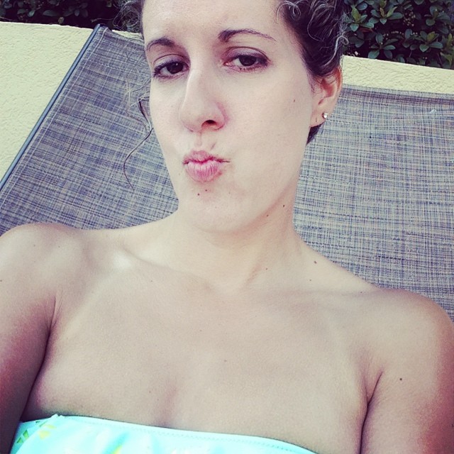 Lounging by the pool as I watch my little sweet girl make some new friends in the pool. #hiltonsandestin