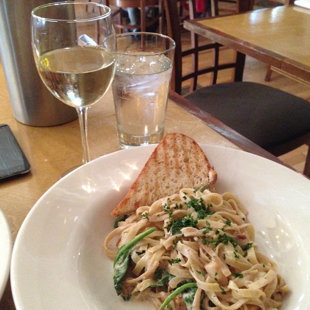 Date night at my favorite homemade pasta place with BriBri. A fettuccine pasta with a garlic wine sauce and scallops. Yumyum. And a glass of Marco Felluga Pinot Grigio. Heaven on a plate!