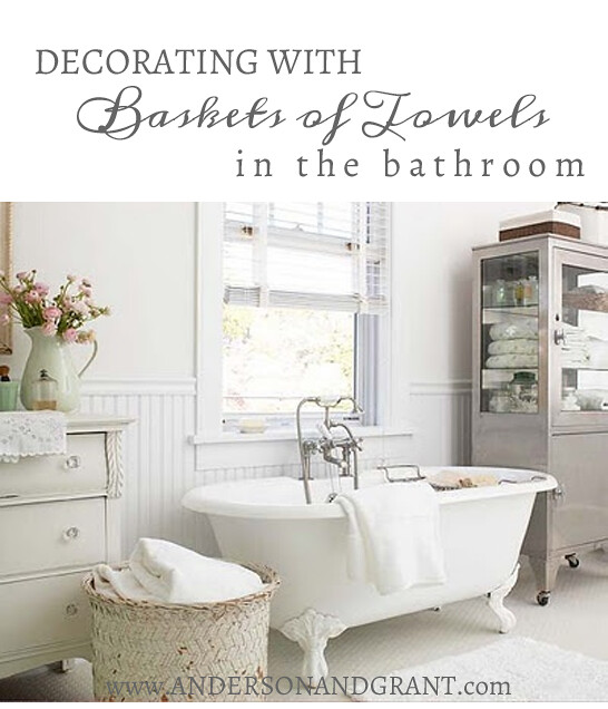 Decorating with Baskets of Towels in the bathroom anderson and grant