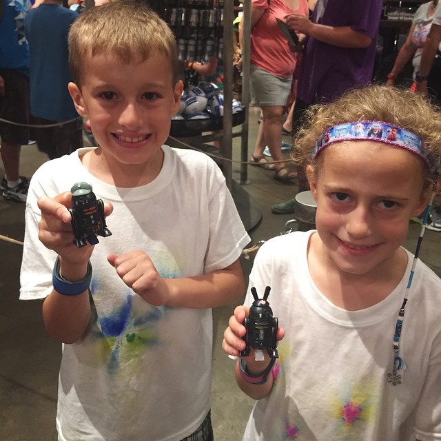 Just finished the Star Wars Tours ride and in the gift store outside it they had a 'Make Your Own Droid' station. Isn't Autumn's with the Mickey ears cute? Now off to do the Jedi Academy! (Can you tell Aut didn't want to take time for a picture? 😉) #
