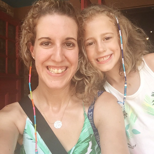 We decided to get hair wraps for fun. I got a rainbow 💙💛💜❤️💚 one and Autumn got a Frozen💙❄️ colored one. So fun! Except my hair is a hot mess in this Florida humidity! 😁 #hair