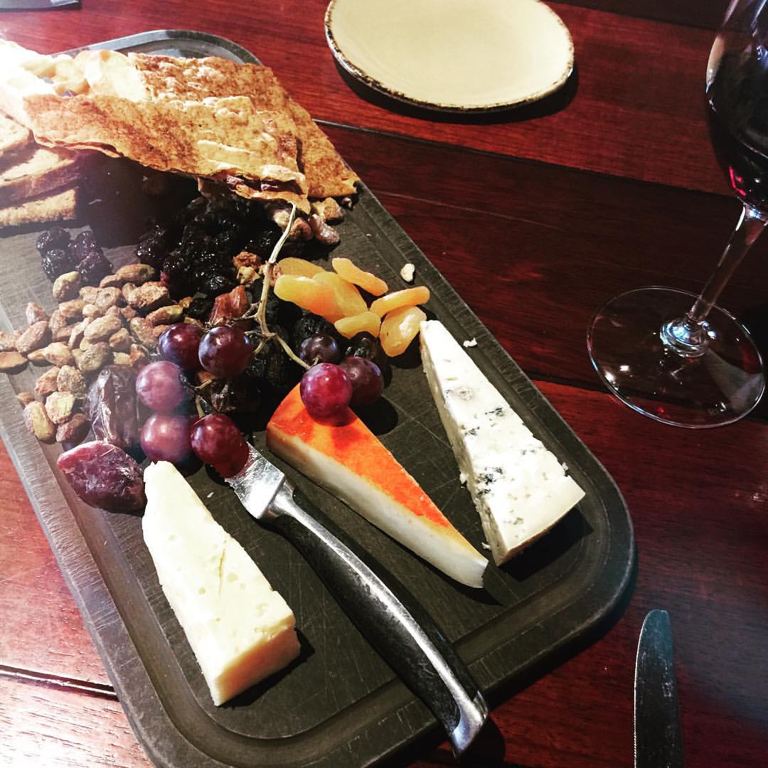 Brian and I tried out a new place for dinner tonight. We sat in a room with the most gorgeous view of a sunset outside. 🌅 We have been getting cheese & fruit plates lately for apps, it is kind of our addiction right now. The cheese on the upper ri