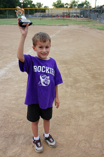 Nathan-holding-up-trophy