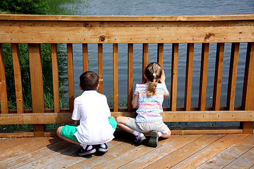 Kids-Looking-Down-at-Water