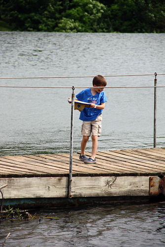 Creek_Nat-on-bridge-with-hat-and-shells