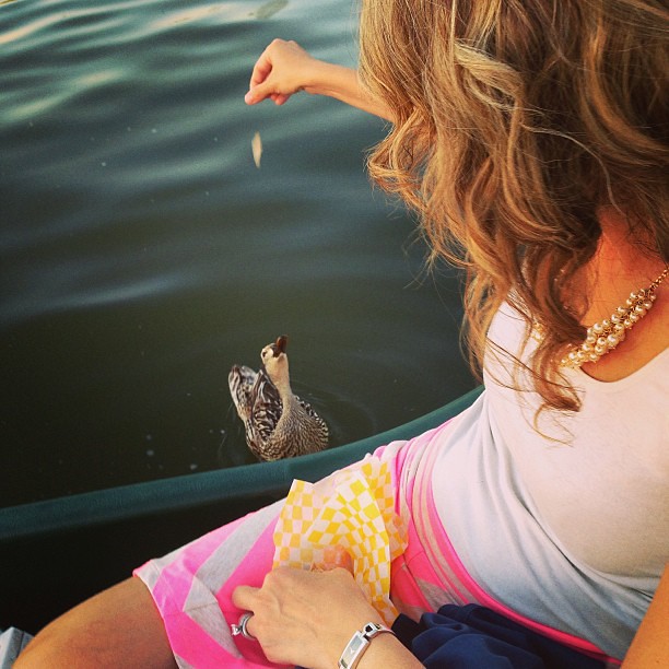 Feeding Mr. Duckie some bread. awwwwwww.