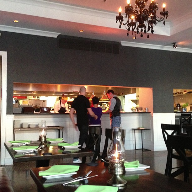 The owner inspects each dish before it goes out... this is like the cooking shows!!!